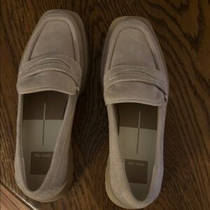 Women’s size 7 beige loafers.